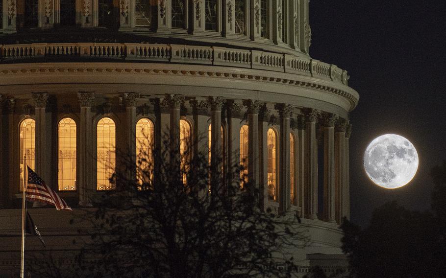 Full moon rises over DC on Halloween Stars and Stripes